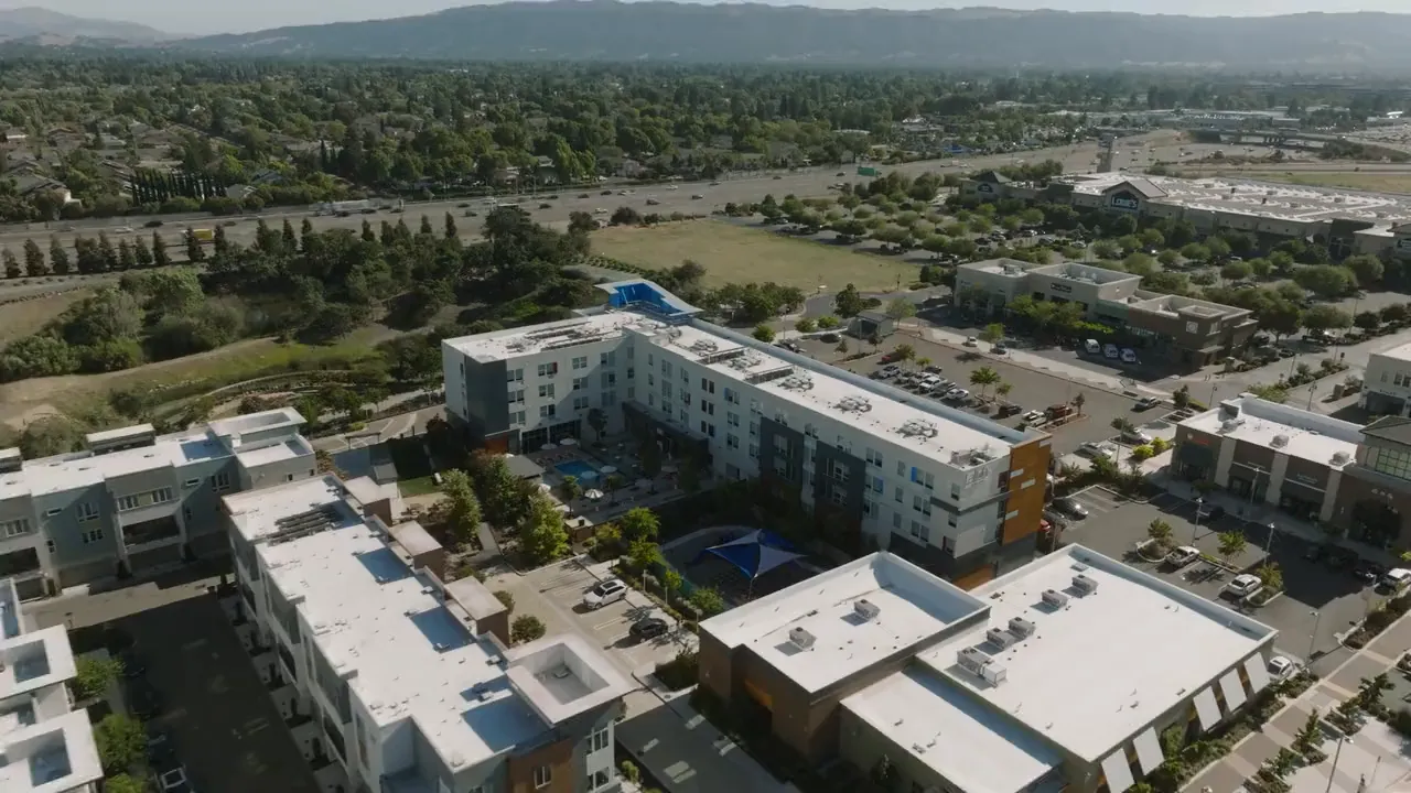 Aerial view of the Aloft Dublin property against the East Bay hills